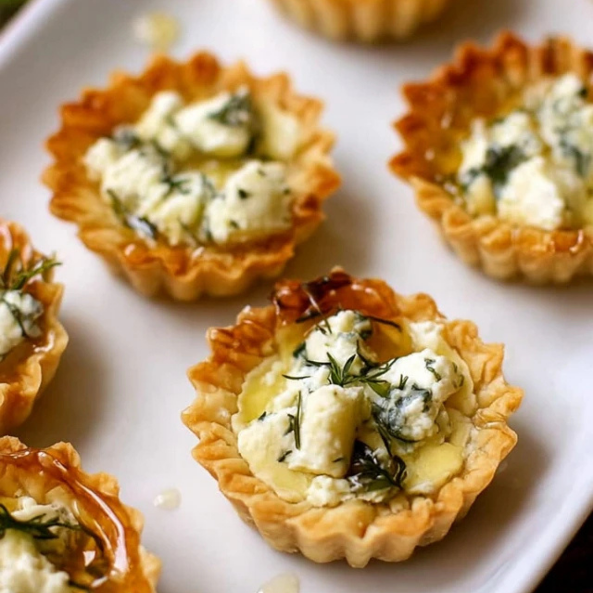 Spring Herb Tartlets with Honey and Goat Cheese