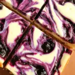 Blueberry Swirl Cheesecake Bars